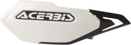White and black ACERBIS X-Elite handguards for motorcycle, mounted on handlebars, with protective body and branding details visible.