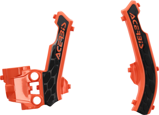 Acerbis X-Grip frame guards for bikes in orange and black, designed by Bill's Exhausts, mounted on a motorcycle frame.