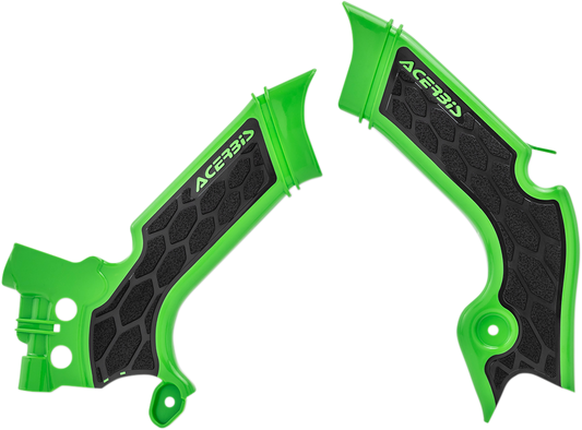 Acerbis X-Grip frame guards in green and black mounted on a motorcycle body, designed to protect the frame and enhance style.