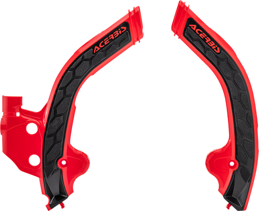 Acerbis X-Grip frame guards in red and black attached to a motorcycle frame, providing protection and style for the bike's body.