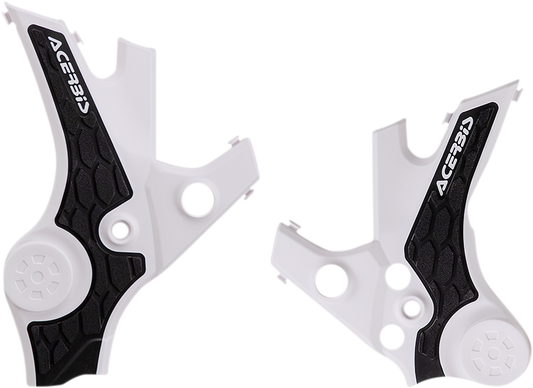 Acerbis X-Grip motorcycle frame guards in white and black, designed for protecting bike frames, shown on a body image.