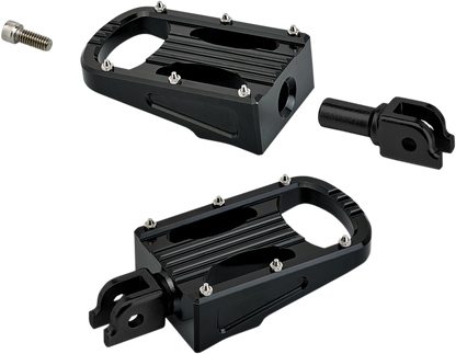 Black BILTWELL Punisher footpeg for Softail motorcycle, made by Bill's Exhausts, shown mounted on bike body.