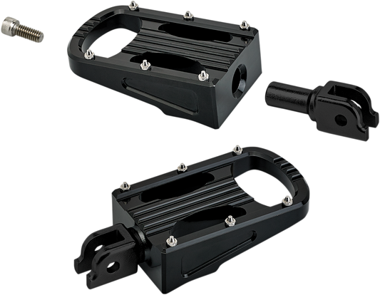 Black BILTWELL Punisher footpeg for Softail motorcycle, made by Bill's Exhausts, shown mounted on bike body.