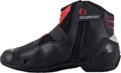Black and red Alpinestars SMX1-R V2 motorcycle boots in US size 6 / EU 39, featuring protective design and sturdy construction.