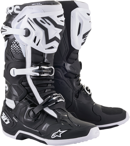 Alpinestars Tech 10 motorcycle boots in black and white, US size 14, featuring rugged design and protective features.