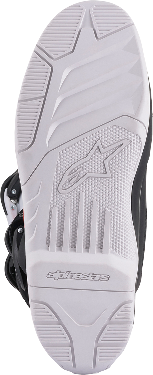 Alpinestars Tech 3 motorcycle boots in black, white, and orange with US size 9, featuring durable protective design.