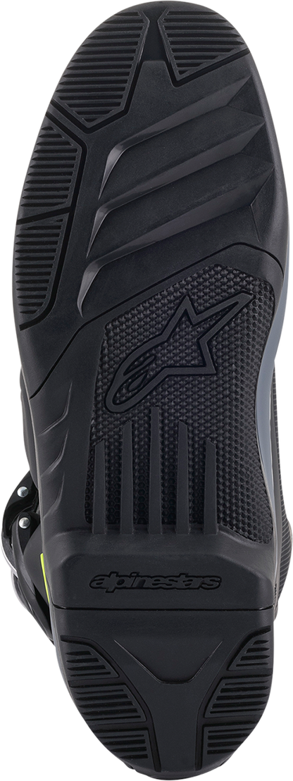 Alpinestars Tech 5 motorcycle boots in black and white, US size 12, designed for durability and protection.