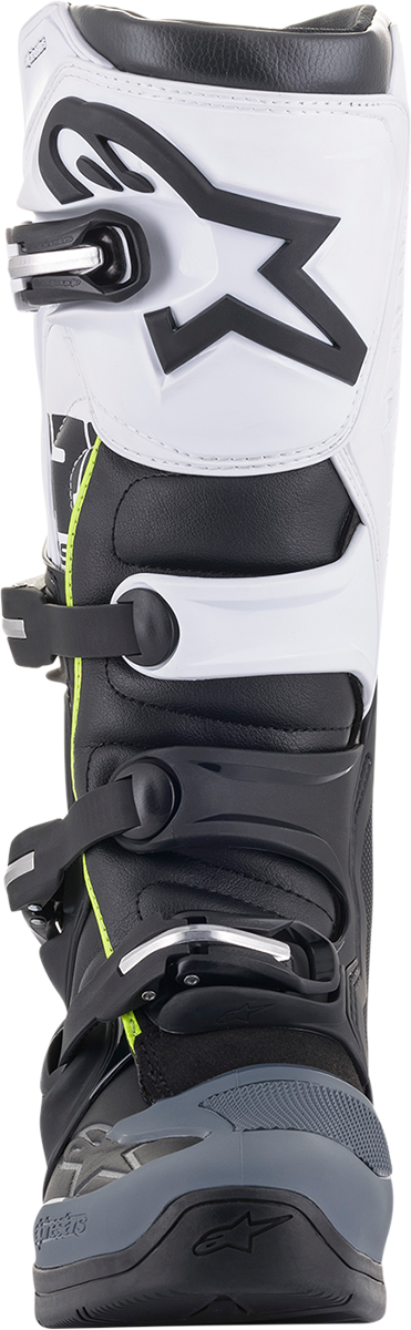 Alpinestars Tech 5 motorcycle riding boots in black and white, US size 13, featuring protective design and durable construction.