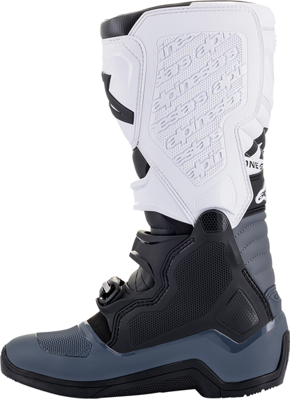 Alpinestars Tech 5 motorcycle boots in black and white, US 13 size, with protective design and sturdy sole.