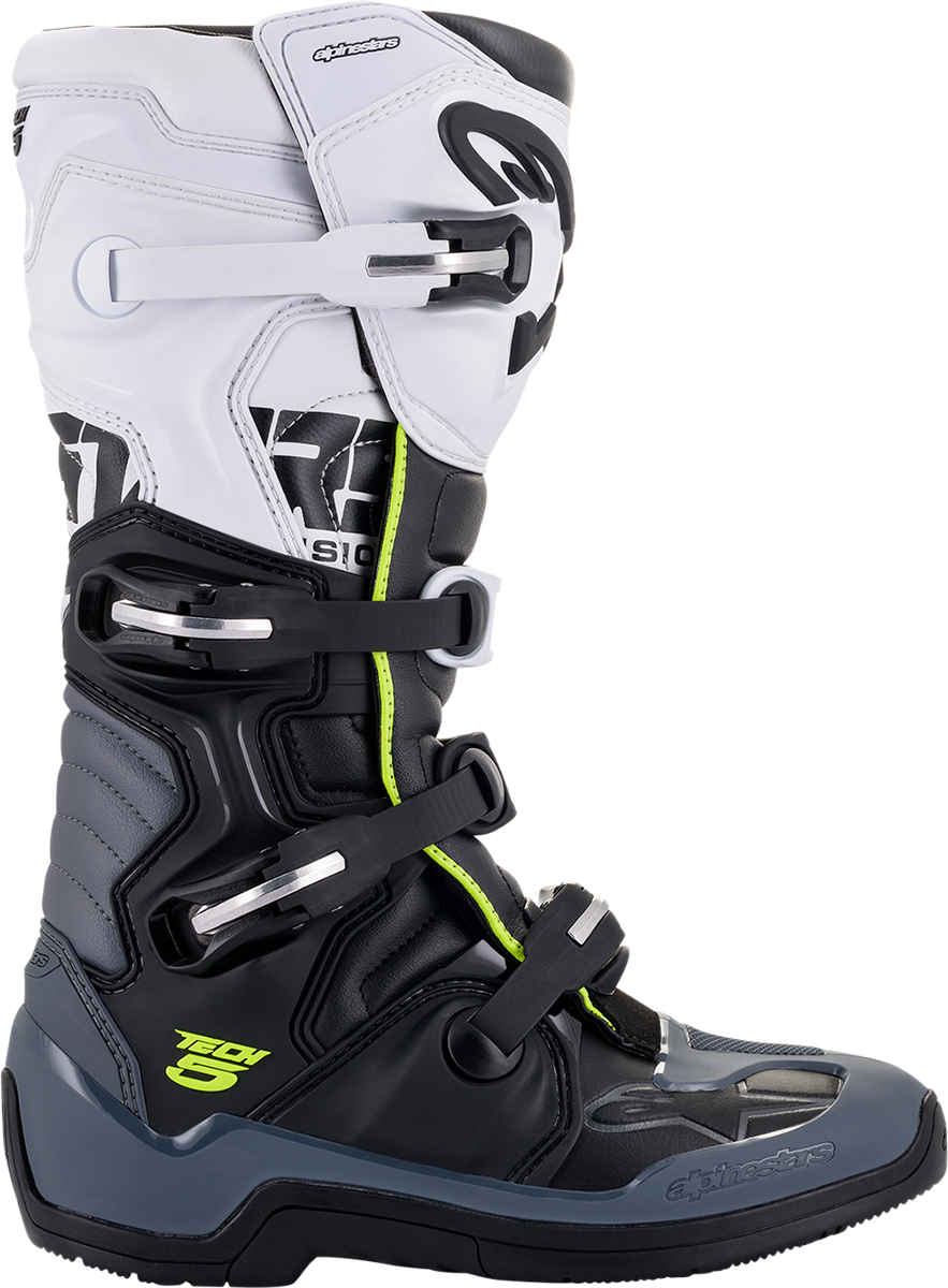 Alpinestars Tech 5 motorcycle boots in black and white, US 13, with rugged design and protective features.