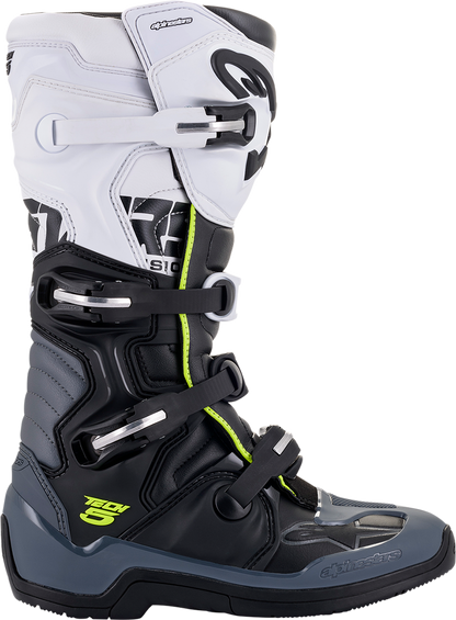 Alpinestars Tech 5 motorcycle boots in black and white, US 13, with rugged design and protective features.