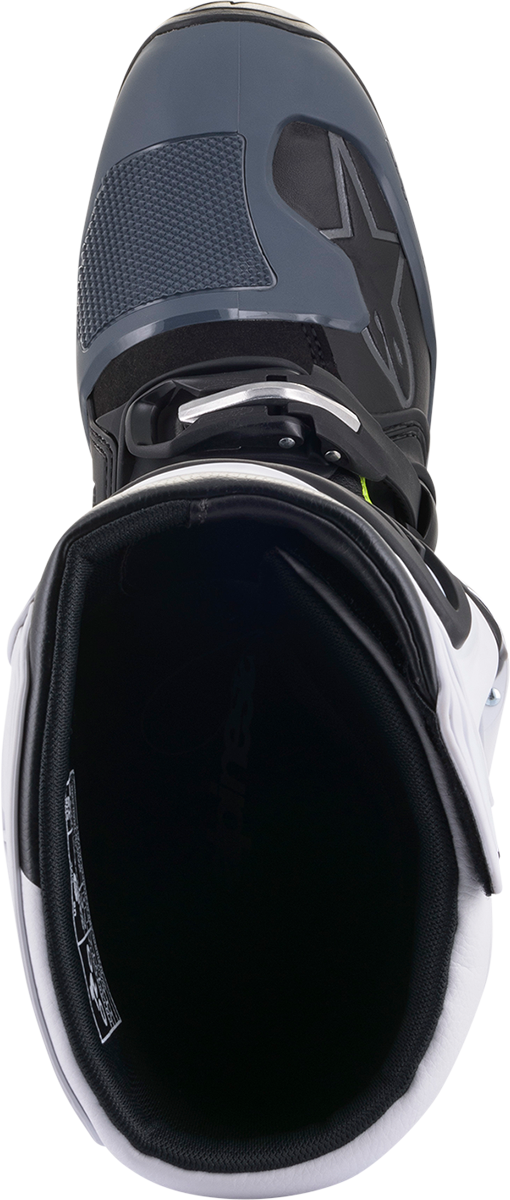 Alpinestars Tech 5 motorcycle boots in black and white, US 13, featuring protective design and sturdy construction.