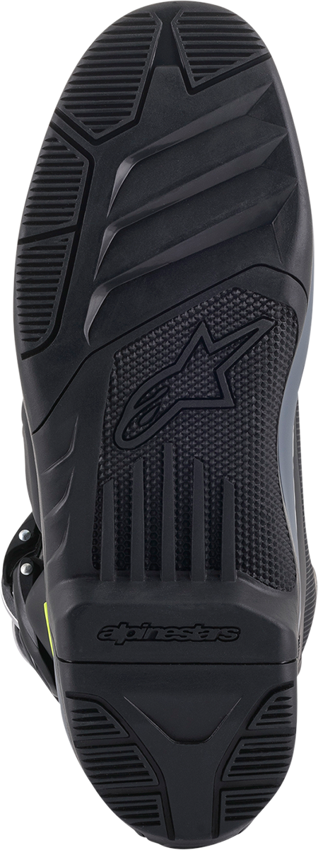Alpinestars Tech 5 motorcycle boots in black and white, US 13, featuring rugged design and protective features.
