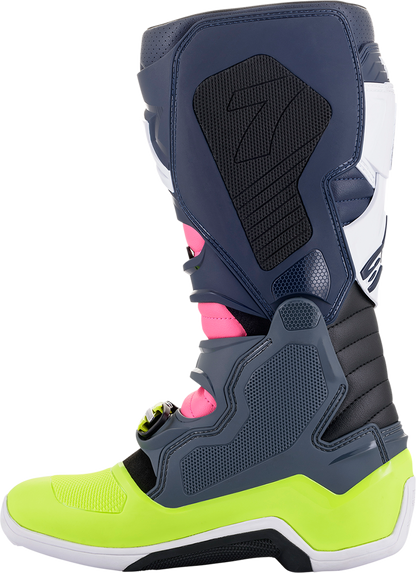 Alpinestars Tech 7 motorcycle boots in black, pink, white, and yellow with US size 10, featuring protective design and sturdy construction.