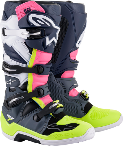 Alpinestars Tech 7 motorcycle boots in black, pink, white, and yellow with US size 11, featuring protective design and sturdy construction.