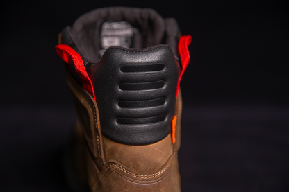 ICON Stormhawk boots in brown, size 11.5, by Bill's Exhausts, featuring rugged leather design and sturdy construction.