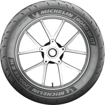 Michelin Road W GT rear motorcycle tire, 180/60R16 size, 74H rating, mounted on a wheel for motorcycle riding.