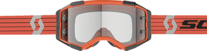 Scott Fury goggles in orange and gray with clear lenses, designed for motocross or racing, featuring a snug fit and adjustable strap.