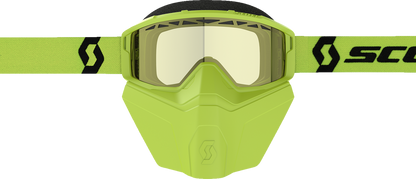 Scott Primal Safari snow goggle with yellow and black face mask, designed for winter sports and outdoor adventures.