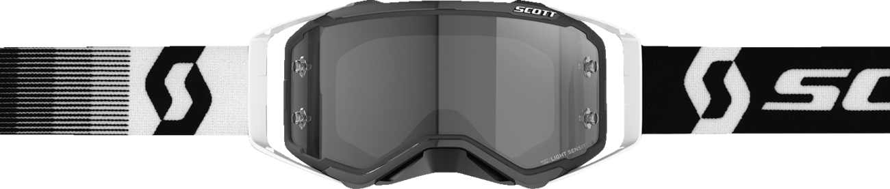 Scott Prospect Sand Dust Goggle by Bill's Exhausts in black and white with light-sensitive gray lenses, designed for outdoor protection.