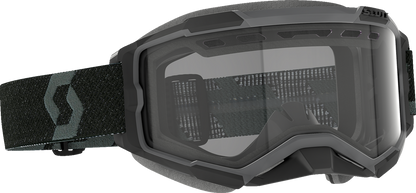 Scott Fury snow goggles in black with clear lenses, designed for winter sports and outdoor activities.