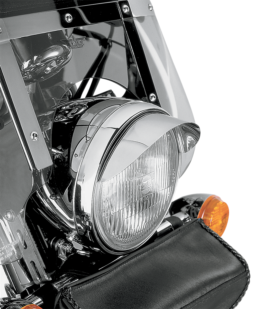 Chrome 7-inch headlight visor for engine by Bill's Exhausts, designed to enhance vehicle appearance and protection.