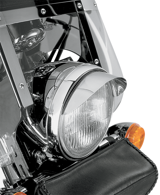 Chrome 7-inch headlight visor for engine by Bill's Exhausts, designed to enhance vehicle appearance and protection.