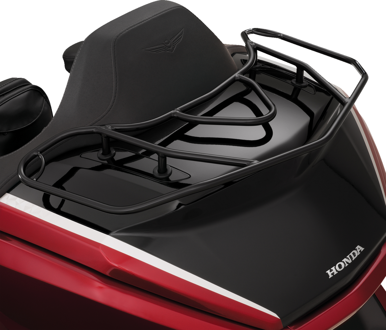 Black Show Chrome luggage rack mounted on a motorcycle engine, showcasing durable metal construction and sleek design.