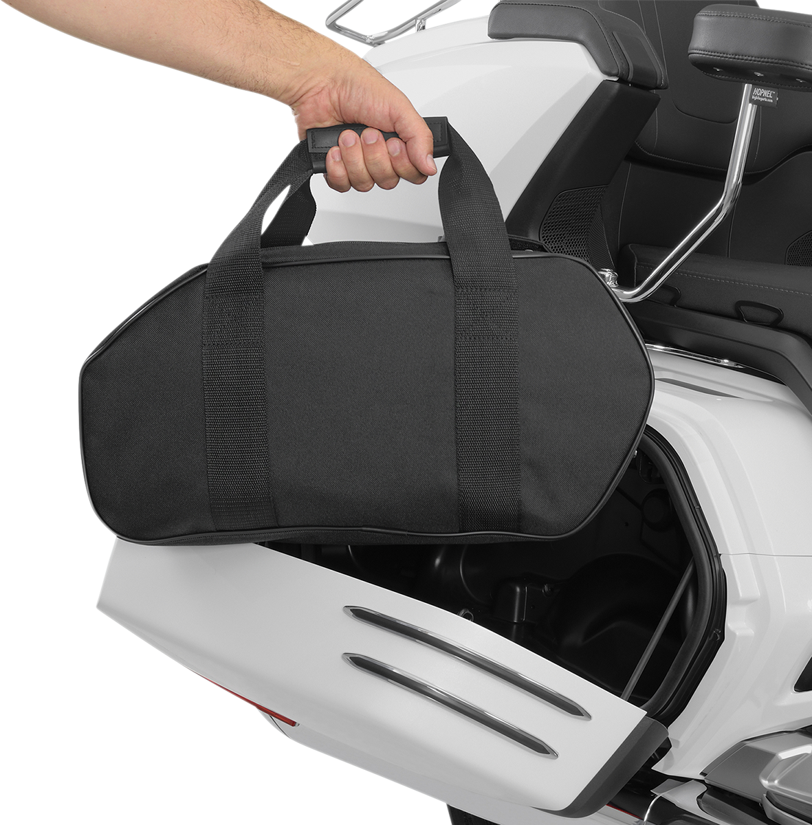 Bill's Exhausts Show Chrome Saddlebag Liner H18SL installed in a motorcycle engine compartment