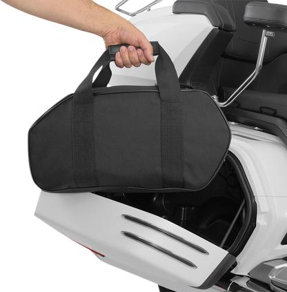 Bill's Exhausts Show Chrome Saddlebag Liner H18SL installed in a motorcycle engine compartment