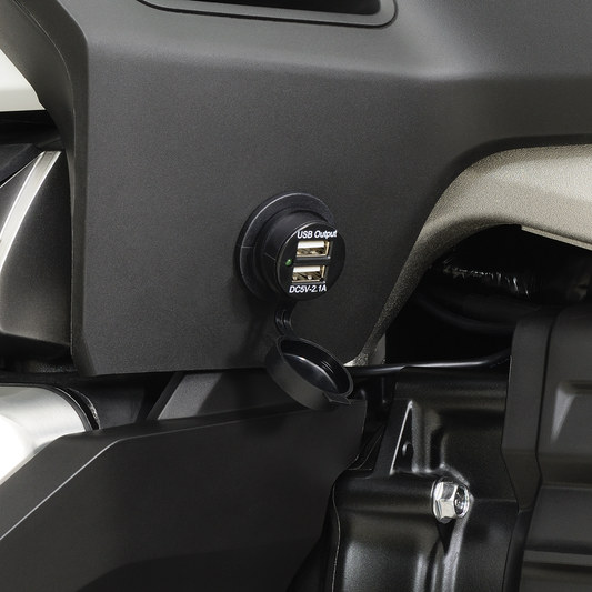 Bill's Exhausts Show Chrome USB Auxiliary Socket for engine with 2 ports, chrome finish, mounted on vehicle engine.