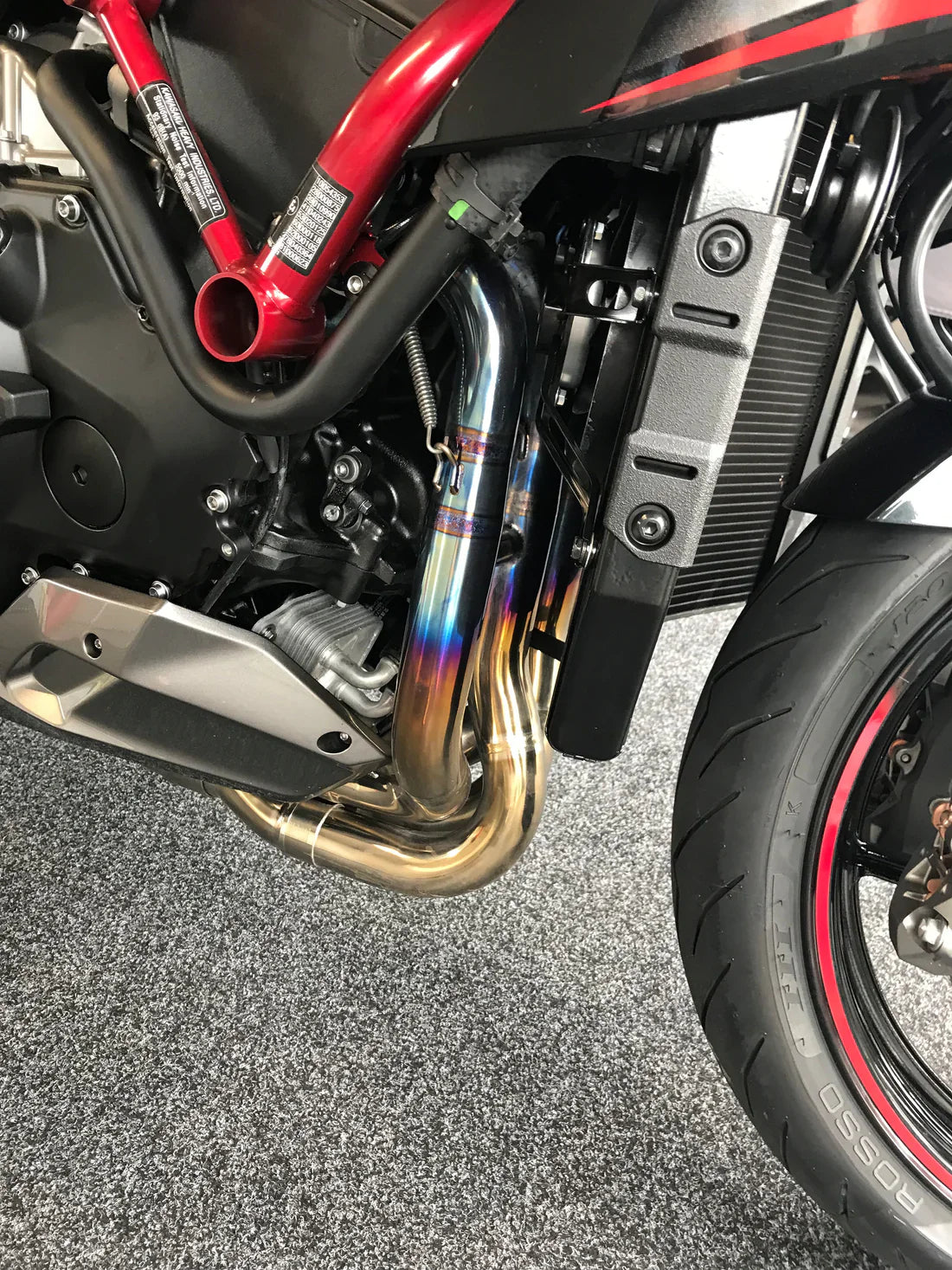 Open box Vandemon polished titanium exhaust system for Kawasaki Ninja ZH2 2020-25 by Bill's Exhausts, showcasing the sleek polished finish.