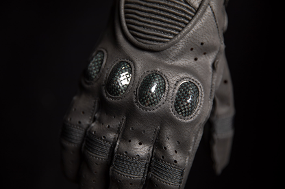 Black ICON Outdrive™ gloves by Bill's Exhausts, small size, close-up of soft, durable motorcycle gloves with textured grip.