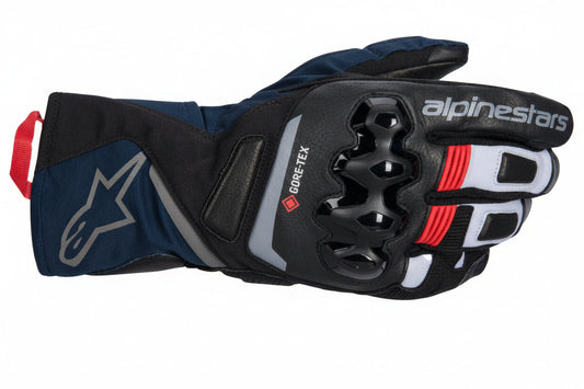 Alpinestars Wt-8 GTX motorcycle gloves in black and blue, medium size, featuring textured palms and secure wrist closure.