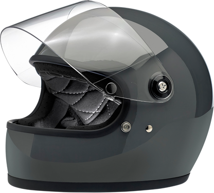 BILTWELL Gringo S helmet in glossy storm gray, size XS, with a sleek design and secure strap, on a plain background.