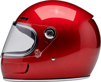 Biltwell Gringo SV helmet in metallic cherry red, medium size, with black straps and ventilation openings.