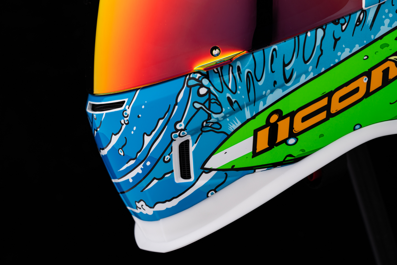Large ICON Airform™ Dino Fury helmet by Bill's Exhausts, featuring vibrant dinosaur-themed design and durable construction.