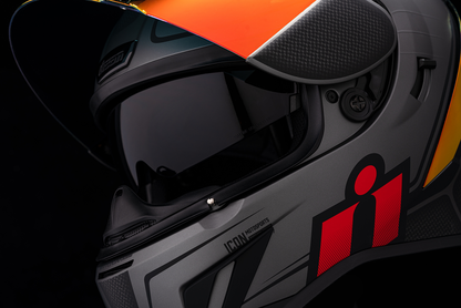 Red ICON Airform™ Helmet in XS size featuring sleek design and aerodynamic shape from Bill's Exhausts.