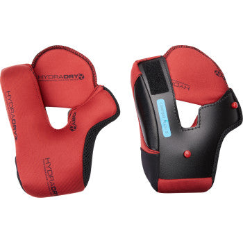 Red ICON Domain™ cheek pads for helmets, XS size, designed for comfort and protection, shown on a motorcycle helmet.