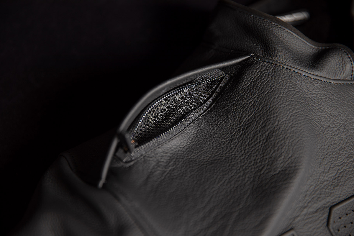 Black ICON Motorhead3™ jacket in 3XL, featuring a sleek design with textured fabric and detailed stitching.