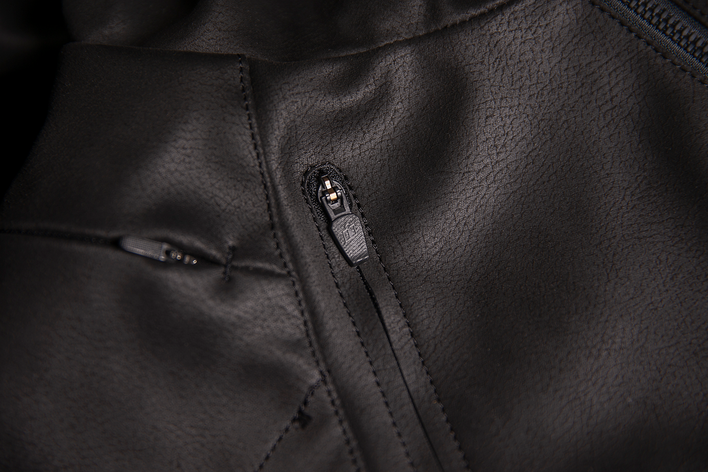 Black ICON Synthhawk Jacket in 4XL by Bill's Exhausts, featuring a stylish design and durable fabric, shown on a plain background.