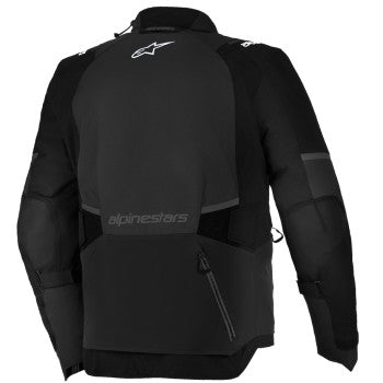 Alpinestars Andes Drystar V4 black motorcycle jacket with brand logo, zipper pockets, and protective armor details.