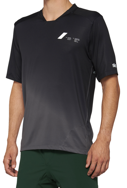 Black and charcoal Bill's Exhausts 100% Celium Jersey, short-sleeve, size small, with sleek fabric and sporty design.