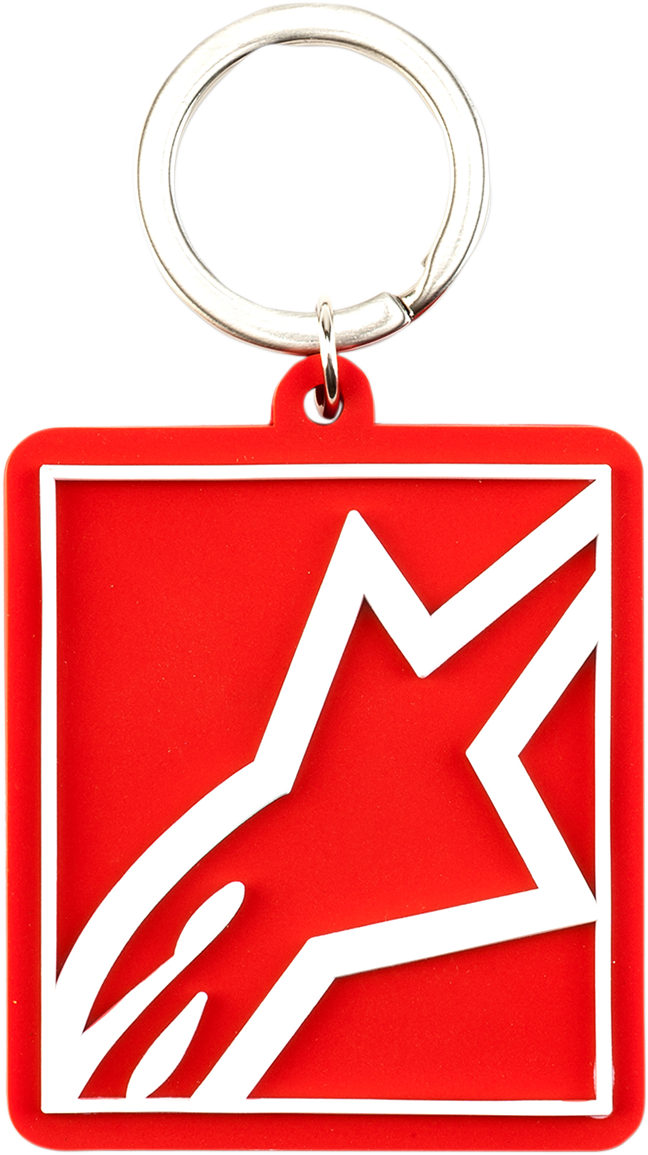 Red Alpinestars Corp Shift key fob with black logo, made by Bill's Exhausts, shown with keyring attachment.