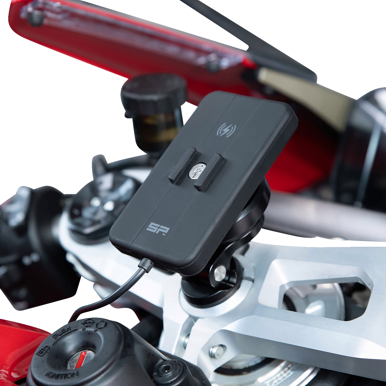 Bill's Exhausts SP CONNECT Wireless Charging Module for phones, showing the sleek charging device with a smartphone attached.