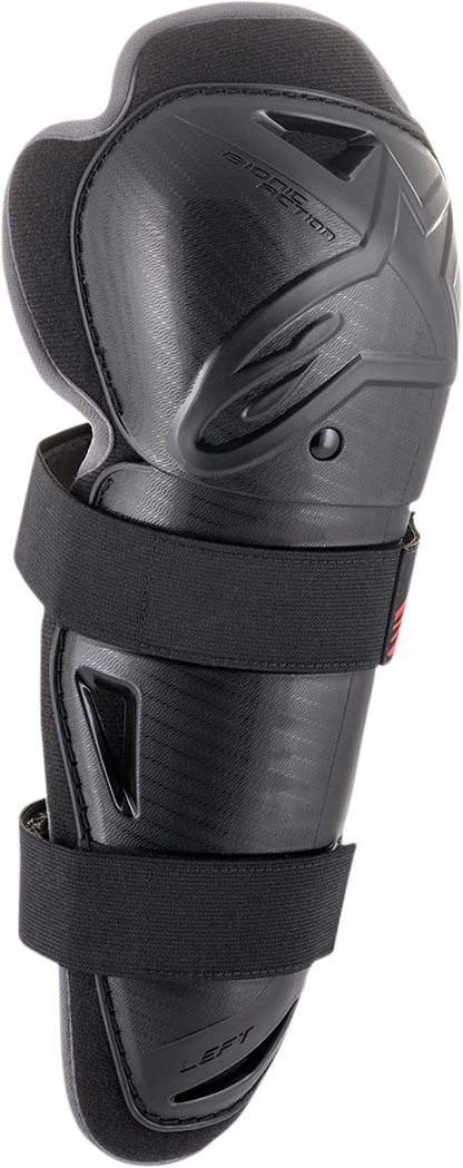 Alpinestars Bionic Action knee guards in protective gear, showing black knee padding with adjustable straps for motorcycle riding.