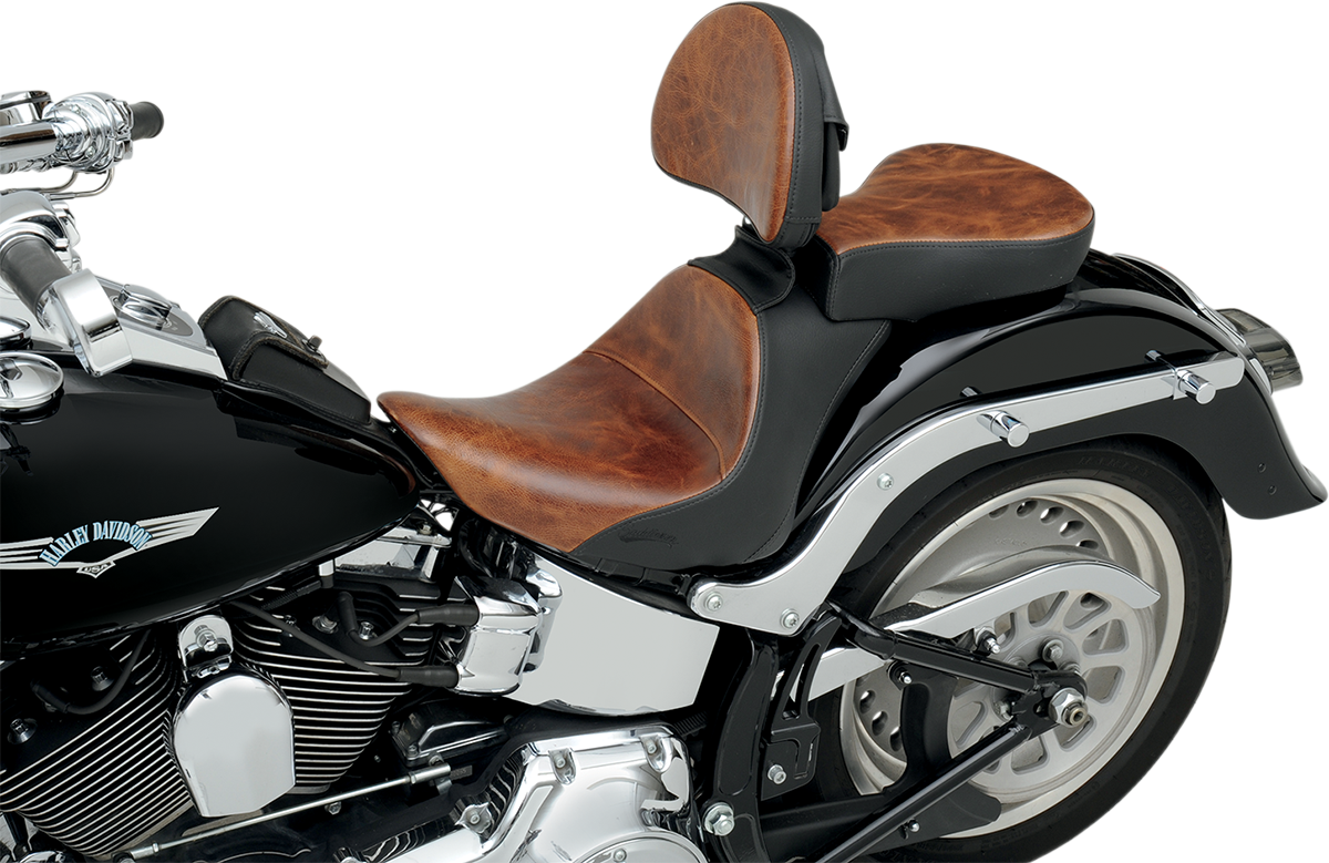 Bill's Exhausts Saddlemens Lariat Seat for Softail 2006-2017, close-up of black leather motorcycle seat with stitching details.