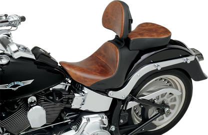 Bill's Exhausts Saddlemens Lariat Seat for Softail 2006-2017, close-up of black leather motorcycle seat with stitching details.