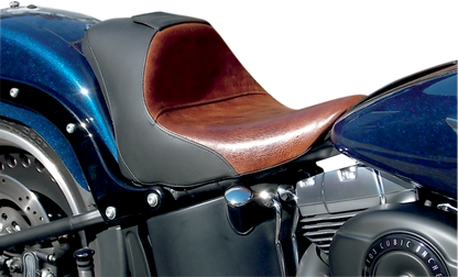 Bill's Exhausts Saddlemen Lariat seat for Softail 2006-2017, shown in black with textured surface and mounting brackets.