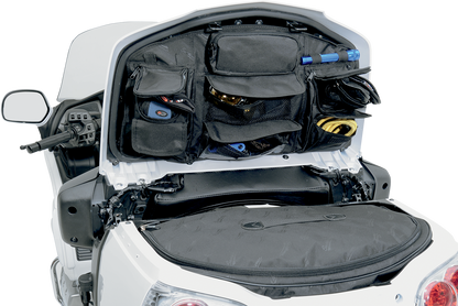 Saddlemens trunk lid organizer for seats, designed for efficient storage in vehicle trunk, with multiple compartments for organization.